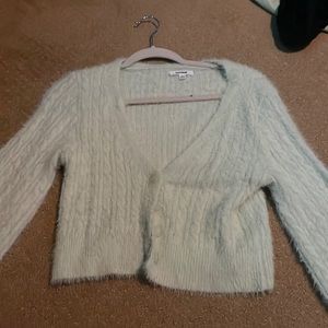 Green garage sweater